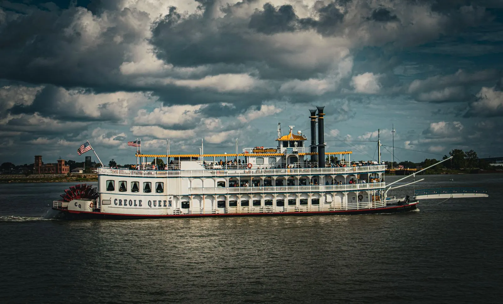 The Creole Queen paddlewheeler on the Mississippi River in New Orleans